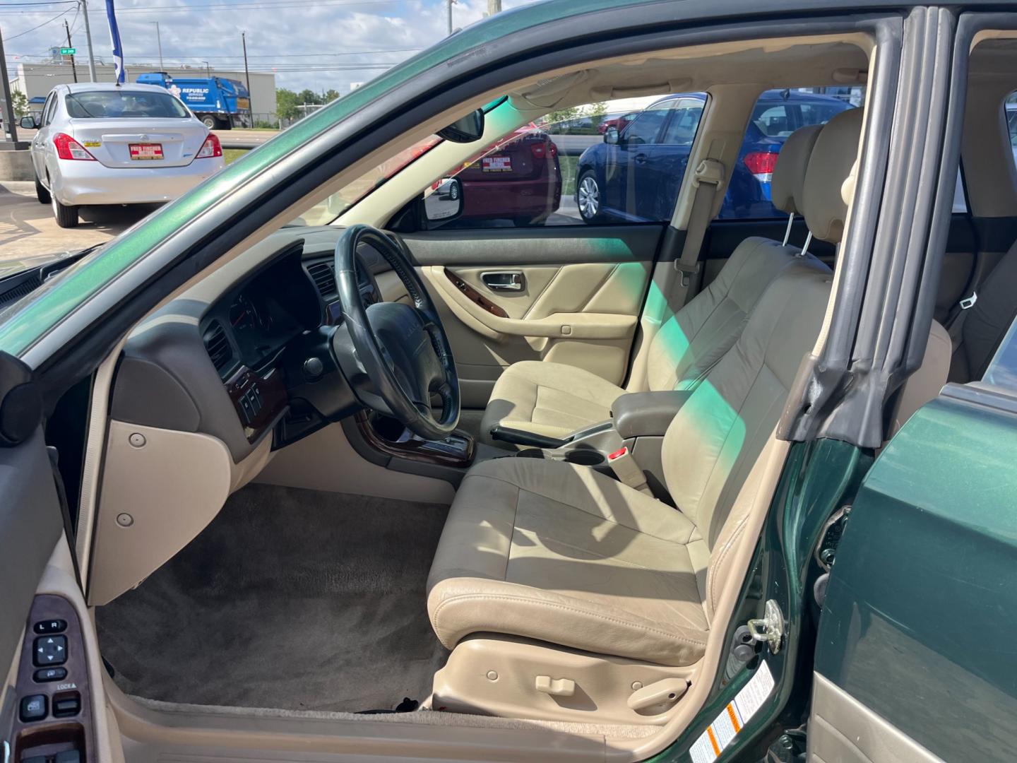 2003 green /TAN Subaru Outback Limited Wagon (4S3BH686737) with an 2.5L H4 SOHC 16V engine, 5-Speed Manual Overdrive transmission, located at 14700 Tomball Parkway 249, Houston, TX, 77086, (281) 444-2200, 29.928619, -95.504074 - Photo#8